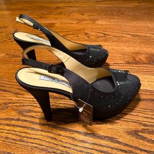 Black Louis Michel heels with Swarovski gems on the front